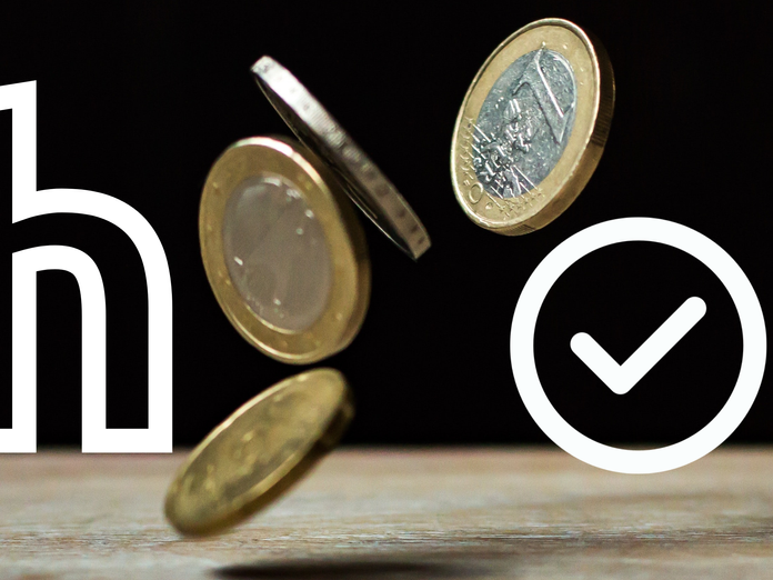 Inflation durch fallende Euromünzen dargestellt